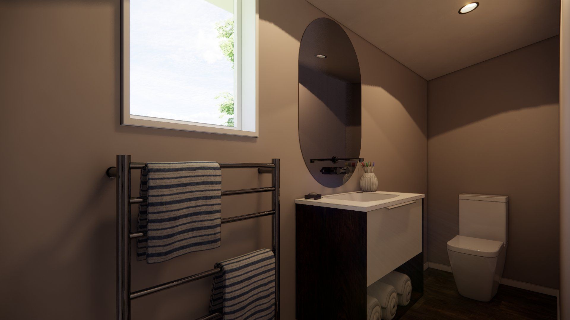 A bathroom with a sink , toilet , mirror and towel rack.