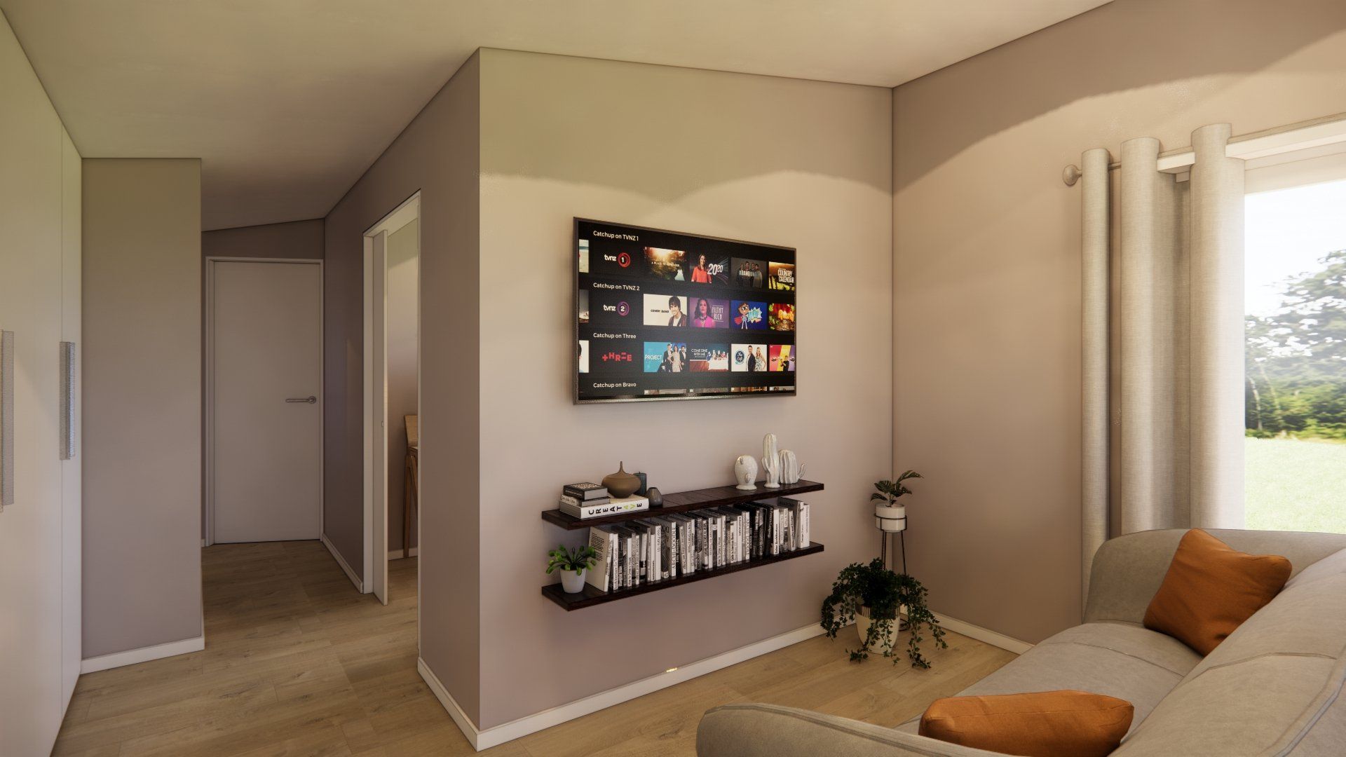A living room with a couch and a flat screen tv on the wall.