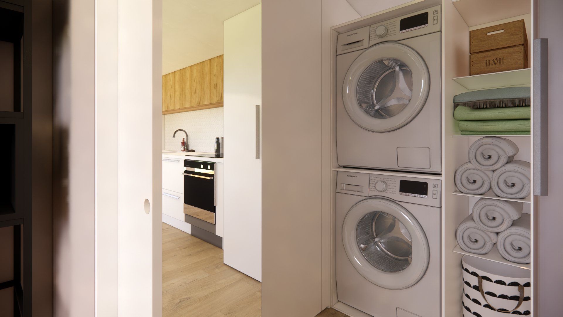 A laundry room with a washer and dryer stacked on top of each other.