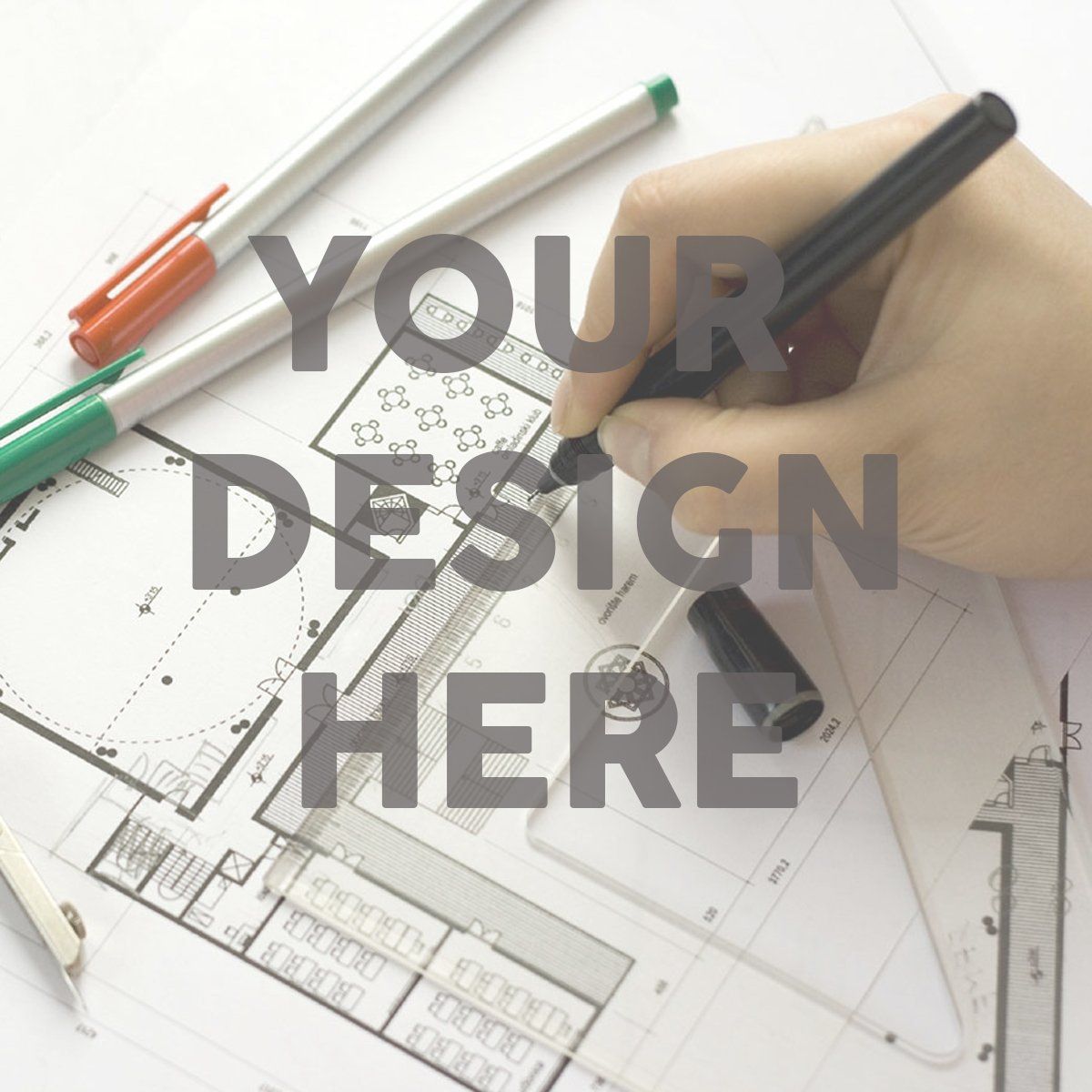 A person is writing on a piece of paper that says your design here