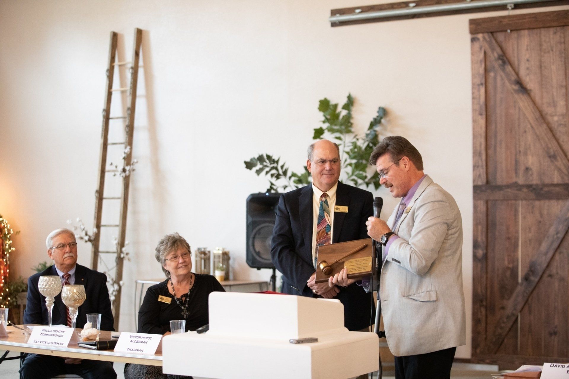 Executive Director presents gavel plaque to outgoing board chairman