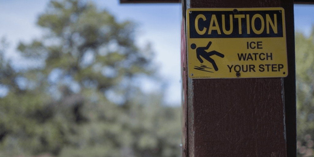 caution while walking sign