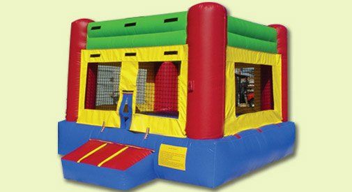 A blue and red bouncy house in the shape of a car.