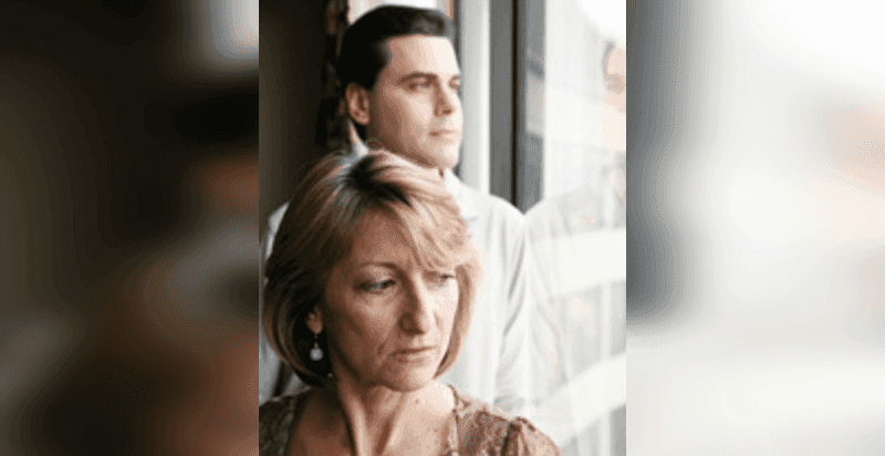 a depressed woman and a man