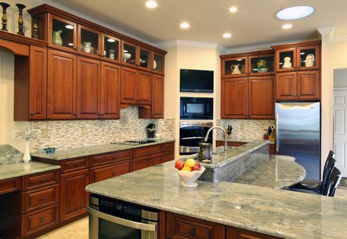 Cabinets — Kitchen with Wood Cabinets and Marble Tops in Wilmington, DE Cabinets — Kitchen with Wood Cabinets and Marble Tops in Wilmington, DE