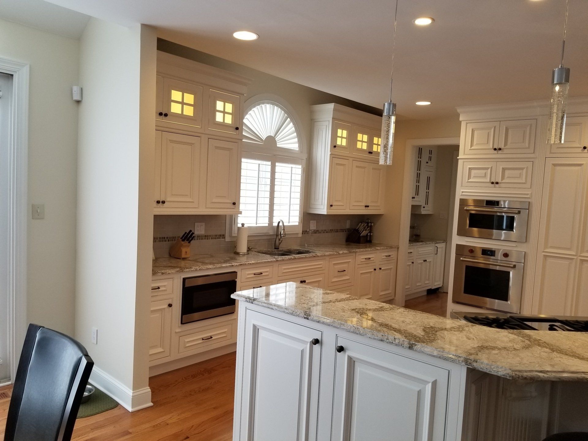 Kitchen Cabinets — Big White Kitchen with Granite Countertop in Wilmington, DE