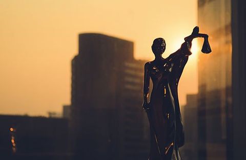 Themis with building background - Lawyers in Rainier, OR Themis with building background - Lawyers in Rainier, OR