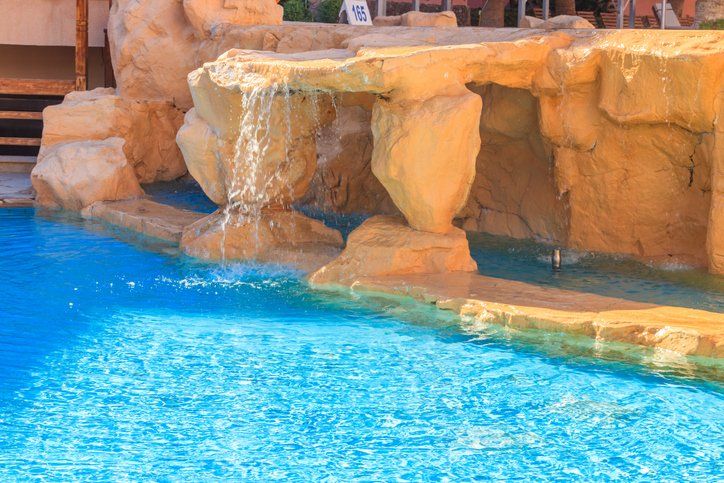 Custom pool with red rock features