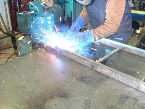 Welding Metal Ladder - Metal Fabrication Services in Crown Point, IN Welding Metal Ladder - Metal Fabrication Services in Crown Point, IN
