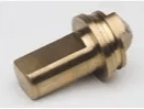 A close up of a brass object on a white surface.