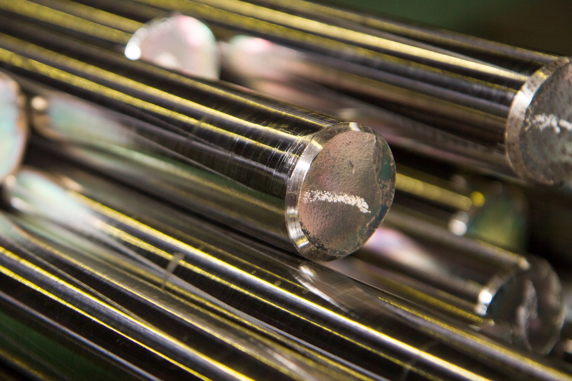 A close up of a bunch of metal rods stacked on top of each other.