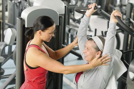 Woman is doing exercises for neck pain relief in Honolulu, HI