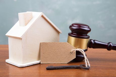 Real Estate — Gavel and House Model on the Wooden Table in Venice, FL Real Estate — Gavel and House Model on the Wooden Table in Venice, FL