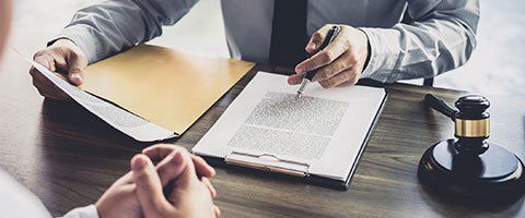 North Carolina Attorney — Lawyer Signing a Paper in Havelock, NC