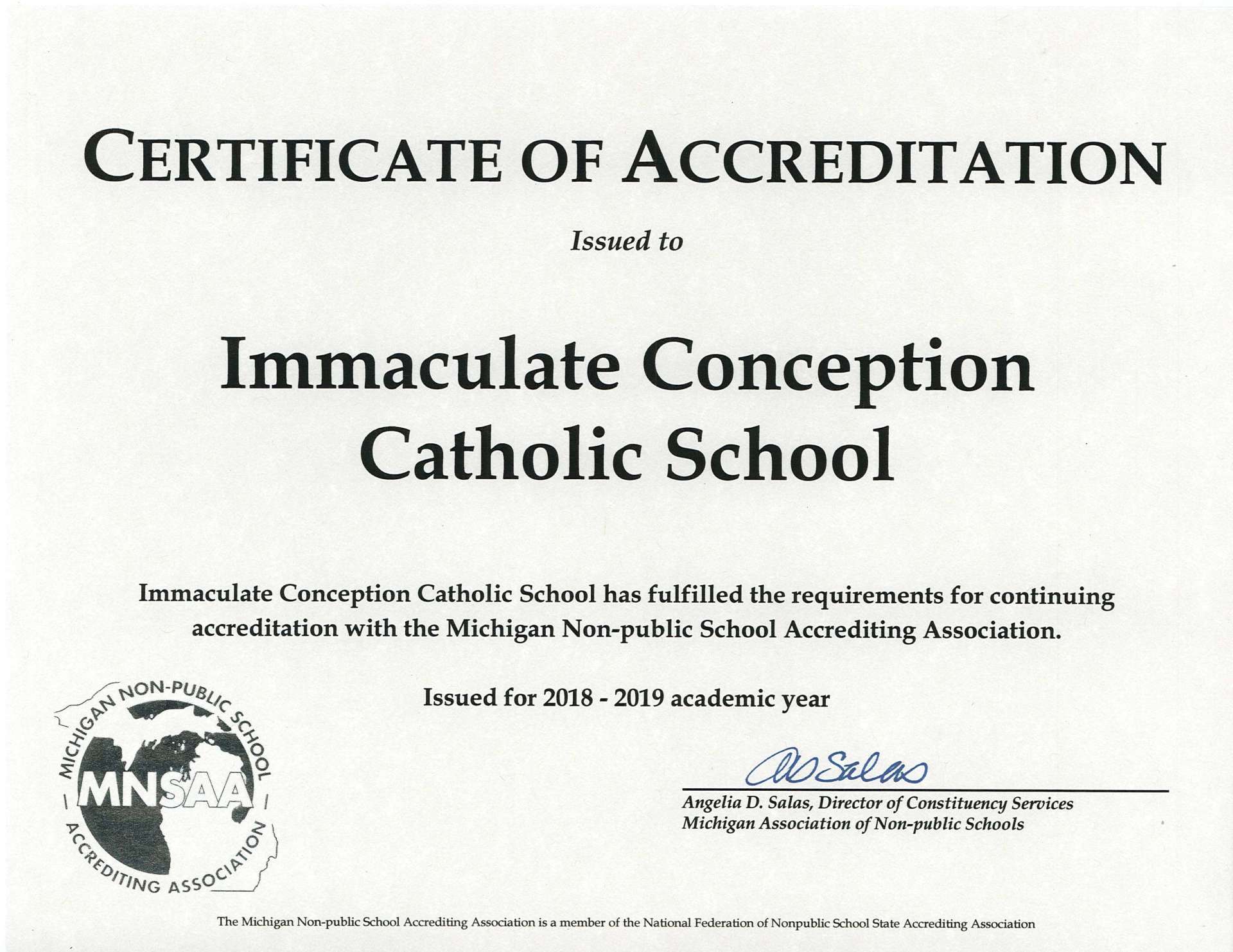 A certificate of accreditation for immaculate conception catholic school