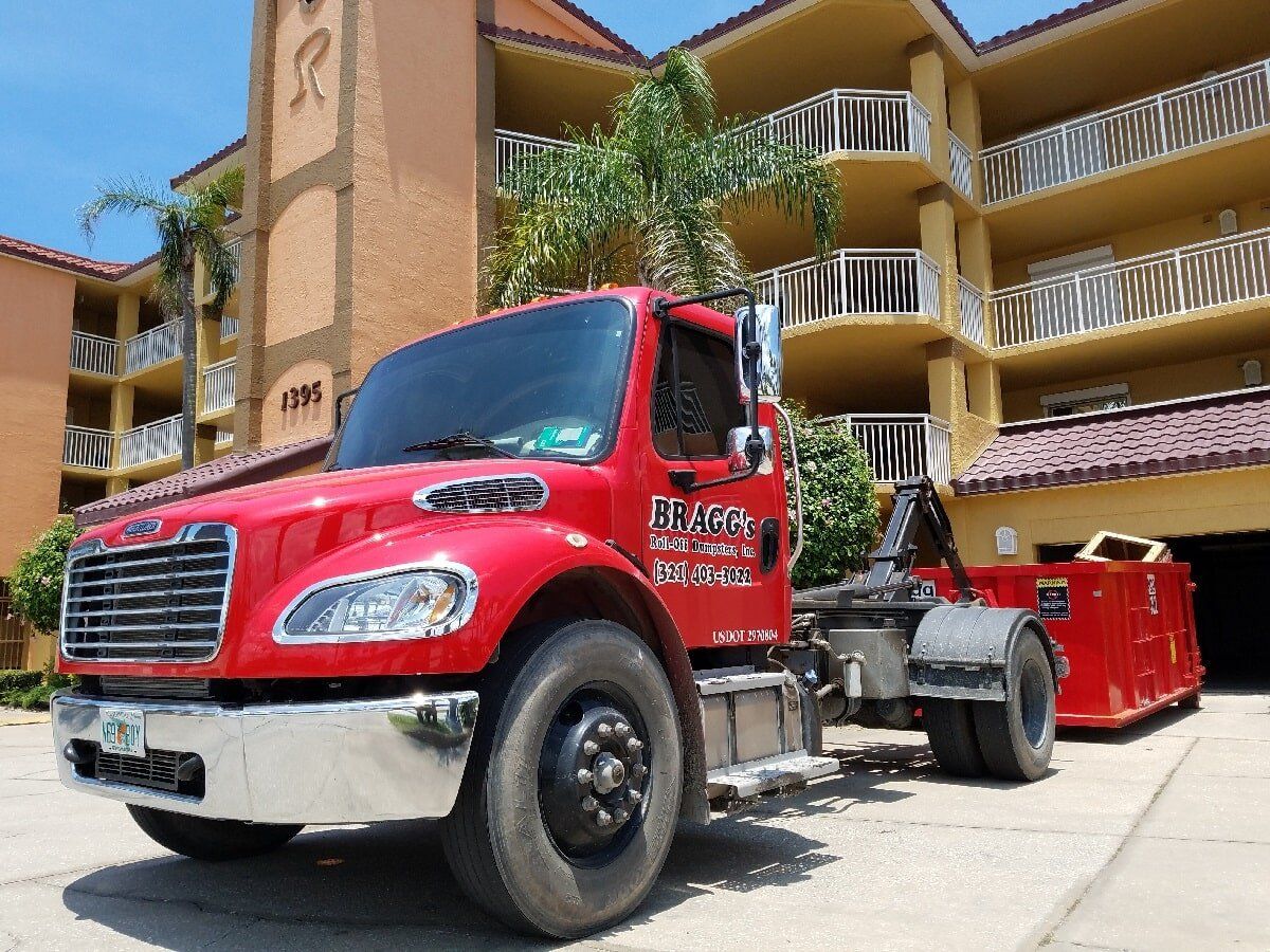 Bragg's Dump Truck — Melbourne, FL — Braggs Roll-Off Dumpsters Inc.