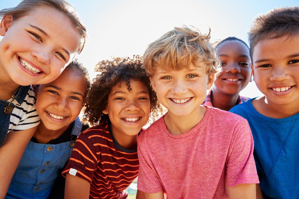 Images of Smiling Kids and Families | Stratas Dentistry