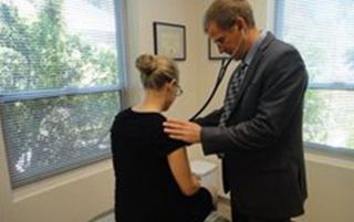 Family Medicine — Doctor checking the patient in Saint Helena, CA