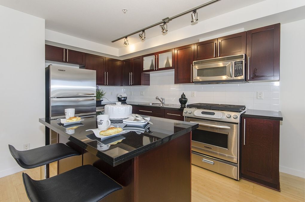 Beautiful view outside of Vancouver from the kitchen of a rental suite in the L'Herimatage Hotel in Vancouver presented by Rebecca Punch at Punch Properties