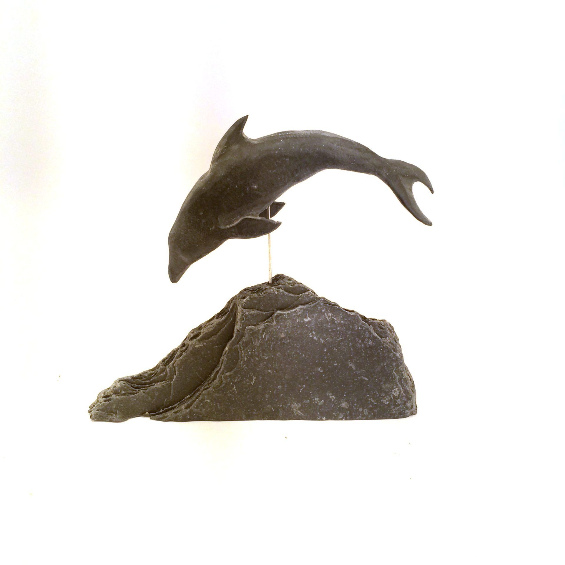 Stone Dolphin leaping. Devonian Mudstone, hand carved in Porthleven
