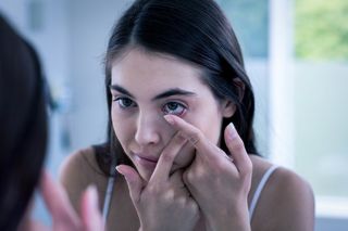 Contact Lenses — Brunette Putting Contact Lenses in San Antonio, TX Contact Lenses — Brunette Putting Contact Lenses in San Antonio, TX