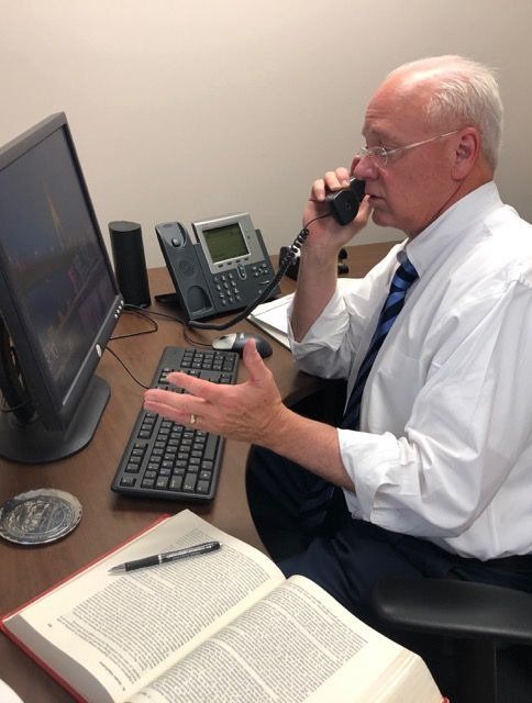 Professional Attorney — Attorney Talking on Phone in Louisville, KY Professional Attorney — Attorney Talking on Phone in Louisville, KY