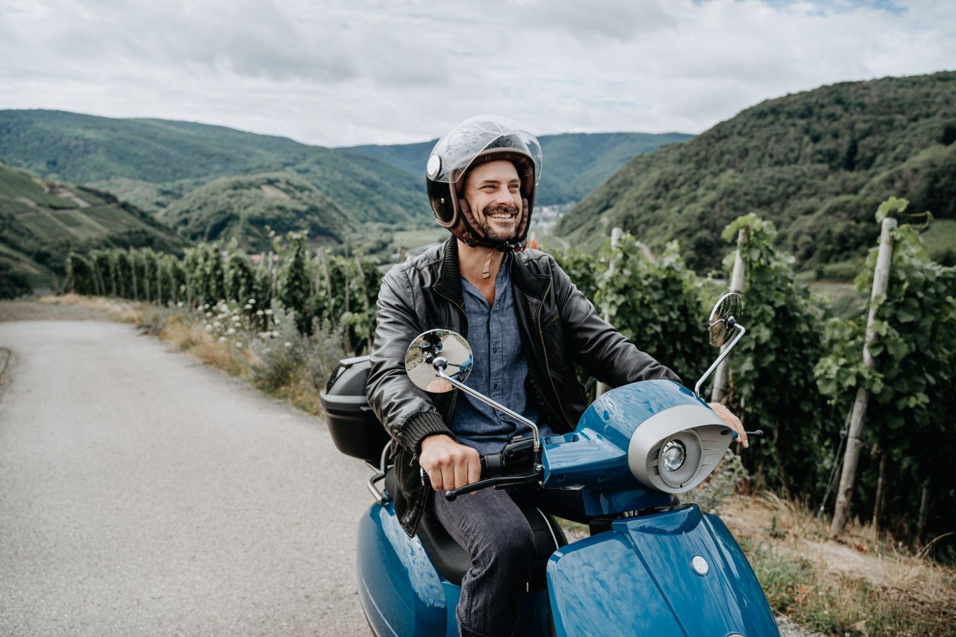 Man on Kumpan electronic motorcycle