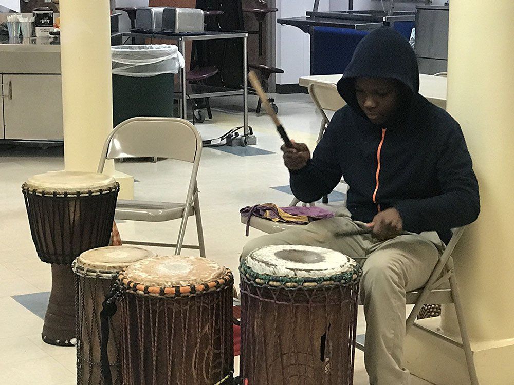 boy playing drum