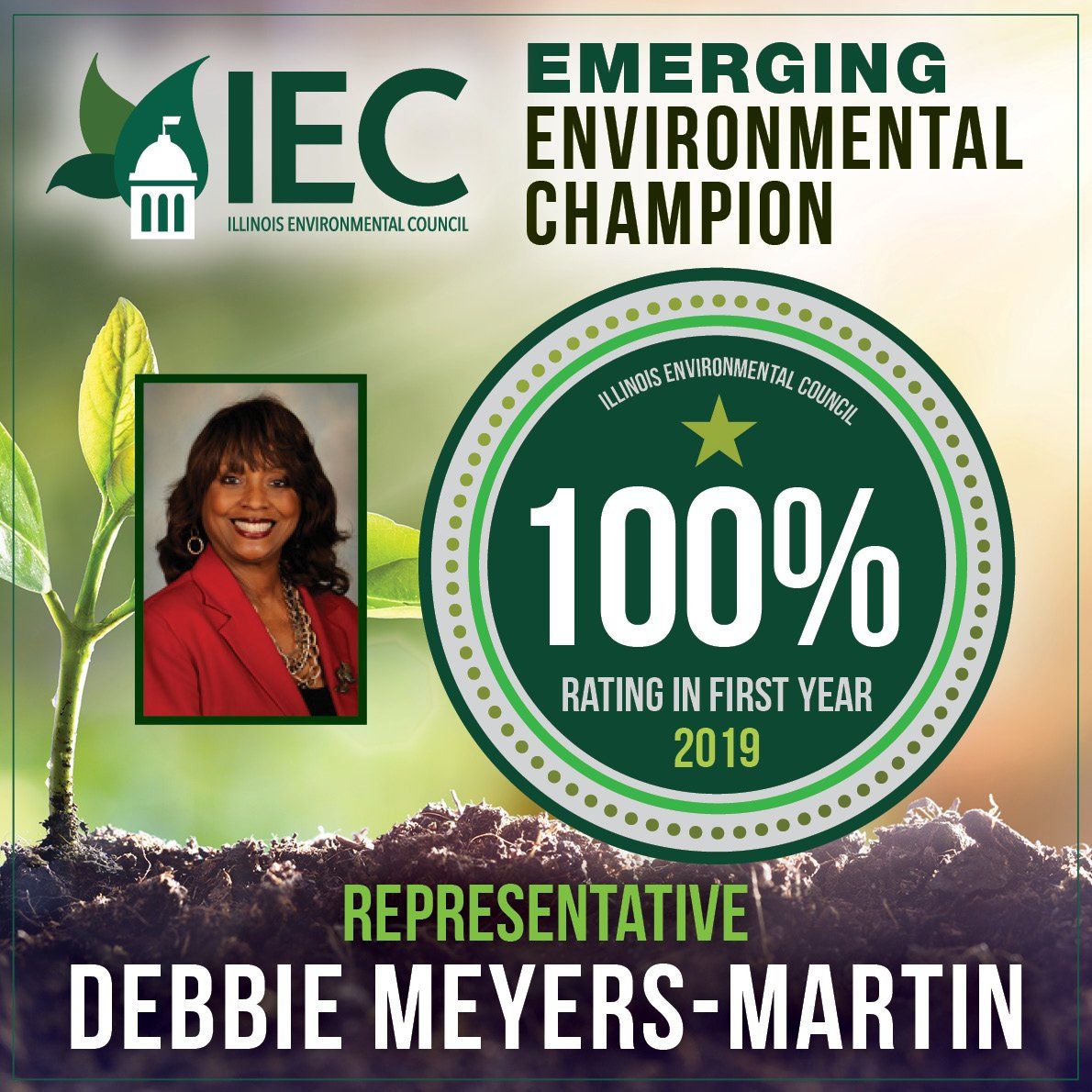 IEC Emerging Environmental Champion award graphic with 100% rating and Debbie Meyers-Martin portrait