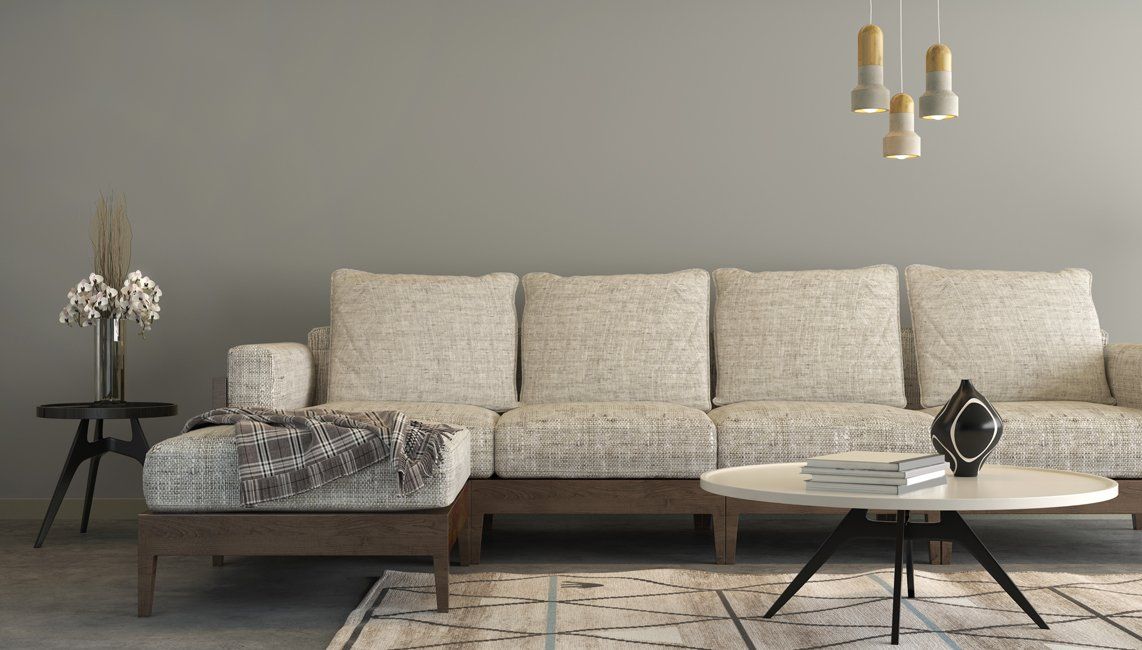 An interior living room with tan and black design