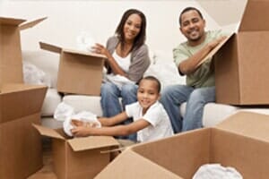 Long Distance Relocation — Happy Family In Ralston, NE Long Distance Relocation — Happy Family In Ralston, NE