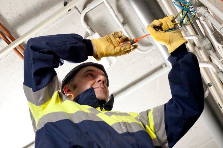 Electrician - Electrician fixing a wire in Lexington, VA