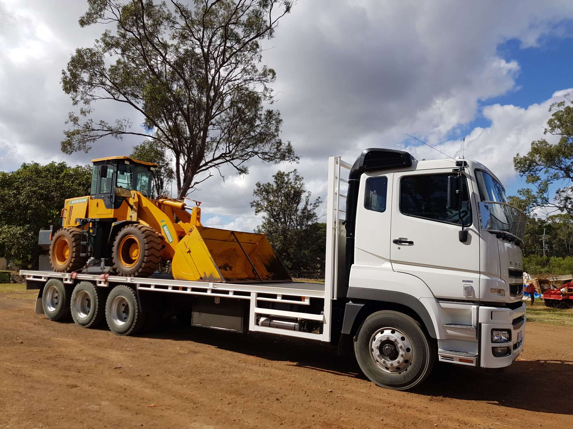 Company Truck with Tractor β Deliveries in Gin Gin, QLD