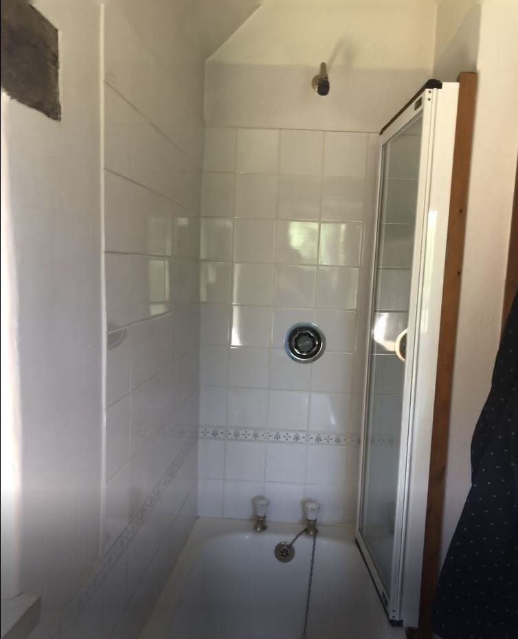 Please look below to find a complete transformation- we created a walk in shower room with beautiful white marble tiles with gloss white furniture.