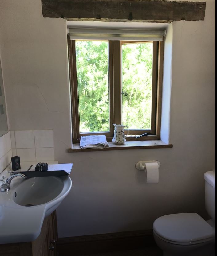 Please look below to find a complete transformation- we created a walk in shower room with beautiful white marble tiles with gloss white furniture.