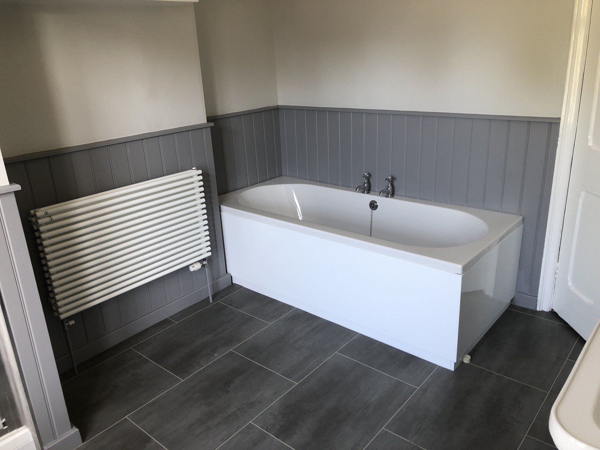 Below is a multiple bathroom installation for a property at Rugby School. The en-suite used to be a storage area which was dead space- but now we have created a functional en-suite. The cloakroom and main bathroom used to be outdated and now they have both been transformed into modern areas.
