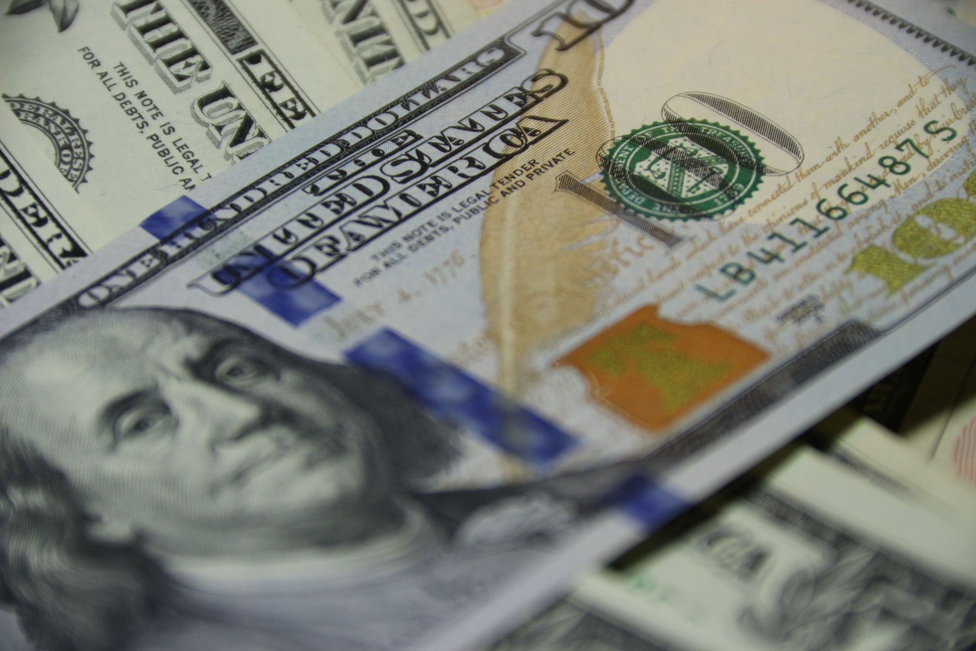 Pile of money saved from bookkeeping services in Anderson, SC