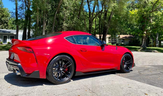 Red Toyota Supra at Exquisite Auto Spa