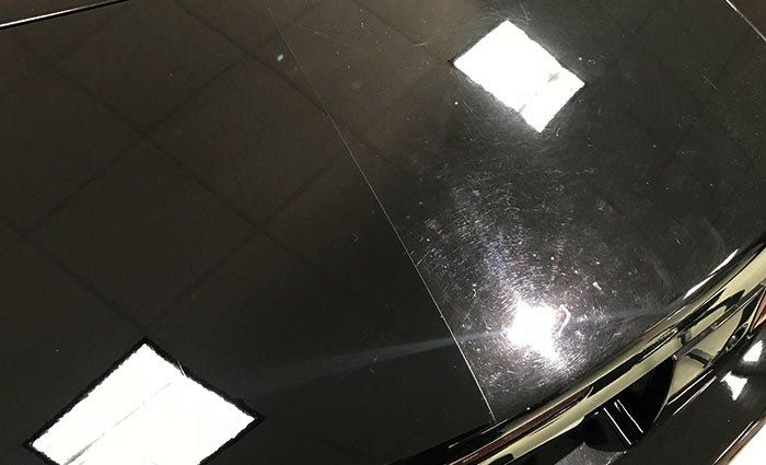 Car hood with swirl marks