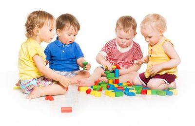 Childcare Solutions — Children Playing Toy Blocks in Leavenworth, KS Childcare Solutions — Children Playing Toy Blocks in Leavenworth, KS