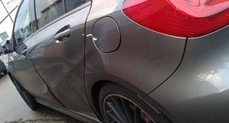 dent on car door