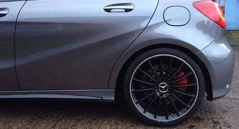 alloy wheel fixed to car