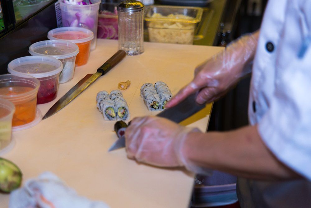 Fresh sushi rolls being prepared at Volcano Steak & Sushi
