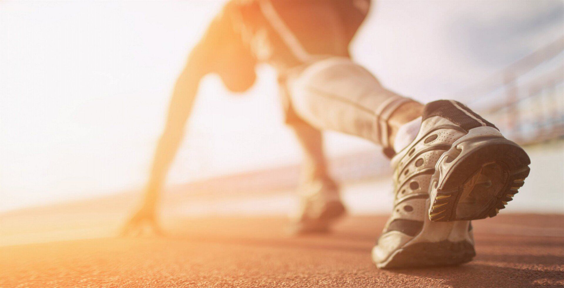 Runner at starting mark of race - laser therapy for foot pain in Kingscliff