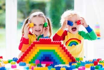 Boy and girl playing lego - Fun toys in Seattle, WA Boy and girl playing lego - Fun toys in Seattle, WA