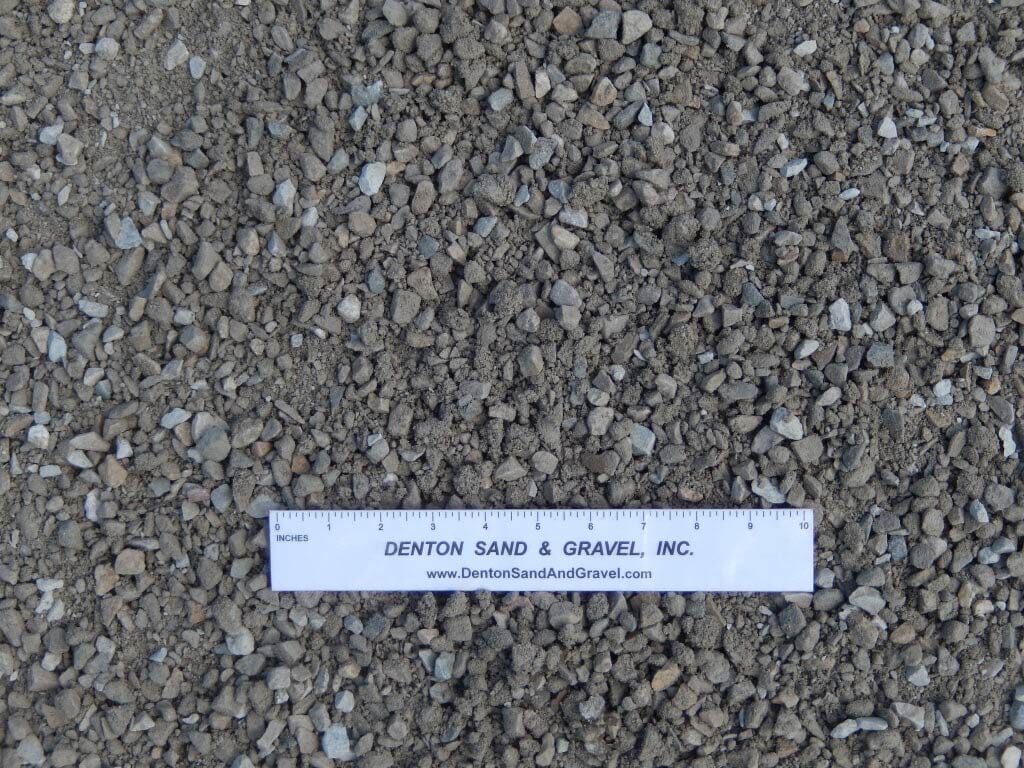 Gravel aggregate with a ruler from Denton Sand & Gravel.