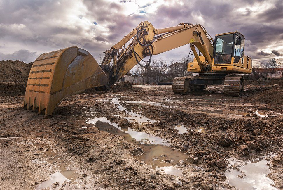 Excavator On A Construction Site — Lower Lake, CA — Epidendio Construction, Inc.