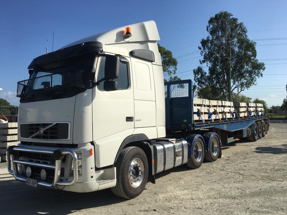 cement slabs being transported by a truck