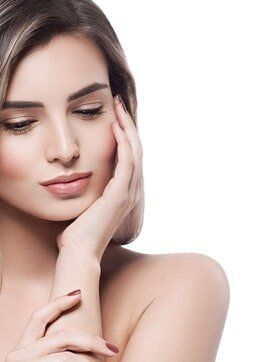 Woman touching face - Hair Removal and Electrolysis in Franklin, MA Woman touching face - Hair Removal and Electrolysis in Franklin, MA