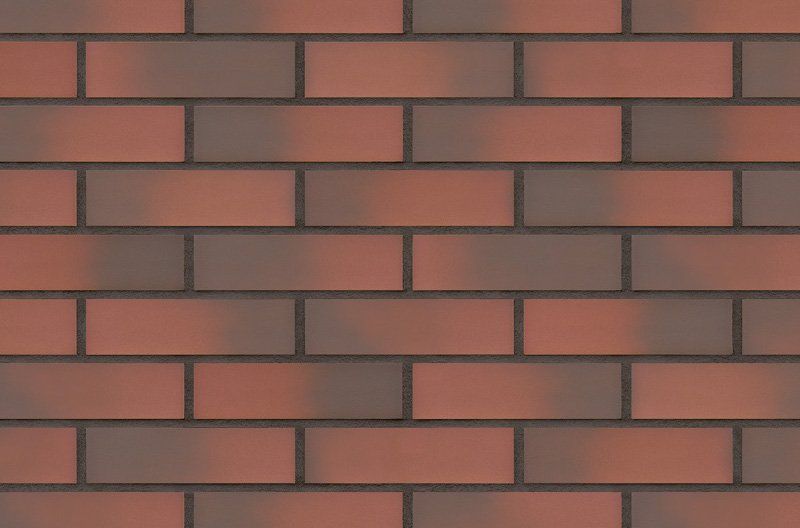 Red brick wall with dark mortar joints.